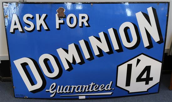 A large tin enamel advertising sign for Dominion Petrol